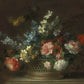 Roses, daffodils, hyacinths, anemones, fritillaries and other flowers in a woven basket