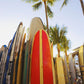 USA, Hawaii, Oahu, Close up view of colorful surfboards in surfboard rack on Waikiki Beach; Waikiki